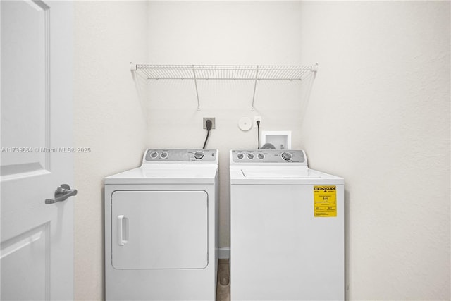 laundry area with washer and dryer