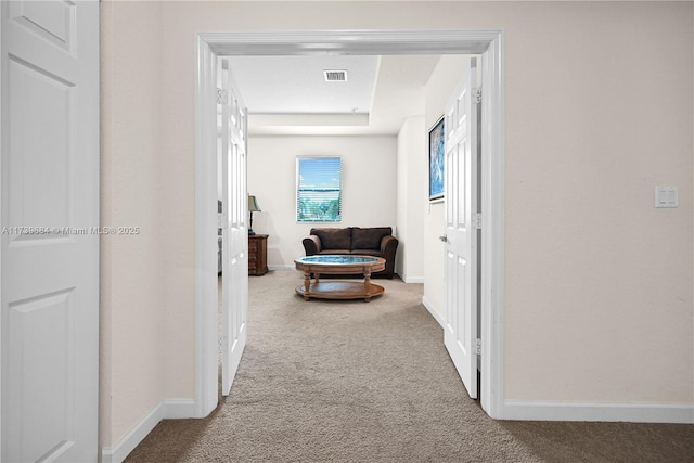 corridor featuring carpet flooring