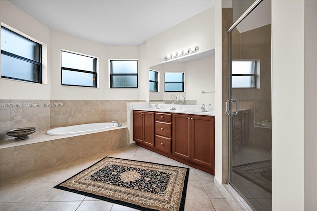 bathroom featuring vanity, tile patterned floors, and independent shower and bath