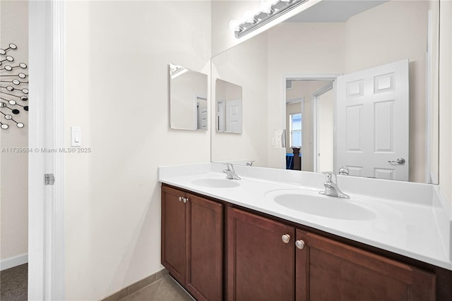 bathroom featuring vanity and tile patterned floors