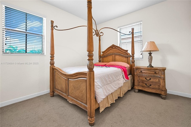 bedroom featuring light colored carpet