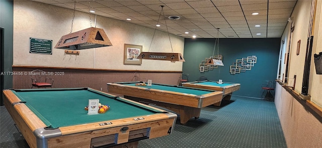 playroom featuring billiards, a drop ceiling, and dark colored carpet