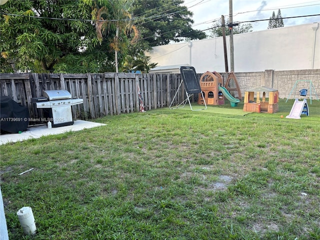 view of yard with a playground