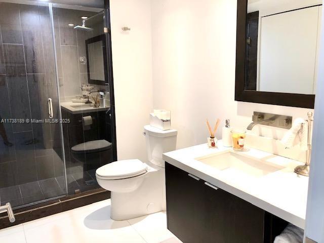 19707 Turnberry Way Unit 10L, Aventura, FL 33180 - full bathroom with vanity and a stall shower