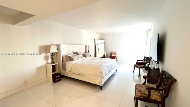 bedroom with tile patterned flooring