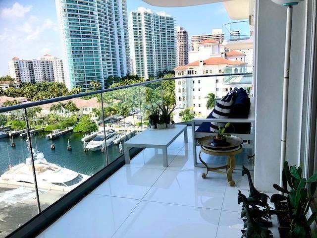 balcony with a city view and a water view