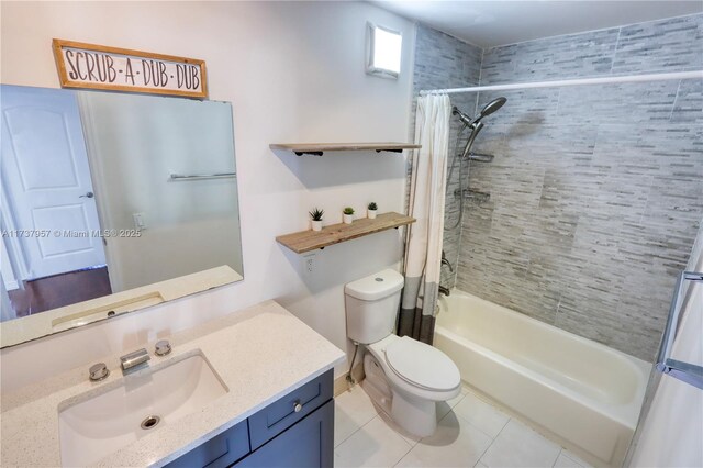 full bathroom with vanity, toilet, tile patterned flooring, and shower / bath combo