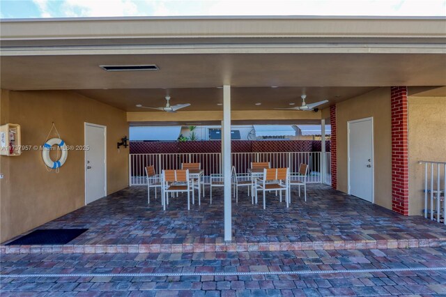 view of patio / terrace with ceiling fan