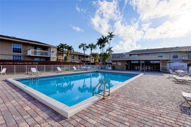 view of swimming pool featuring a patio