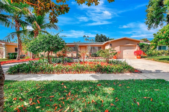 ranch-style home featuring a garage and a front yard