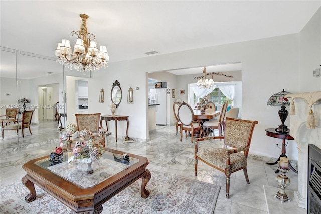 living room with an inviting chandelier