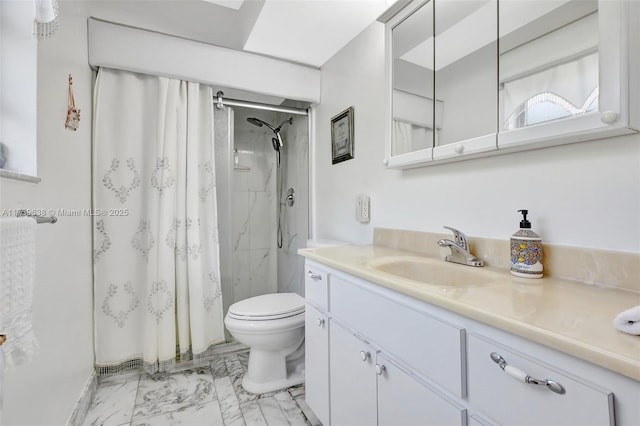 bathroom featuring curtained shower, marble finish floor, vanity, and toilet