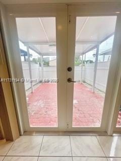 doorway featuring tile patterned floors