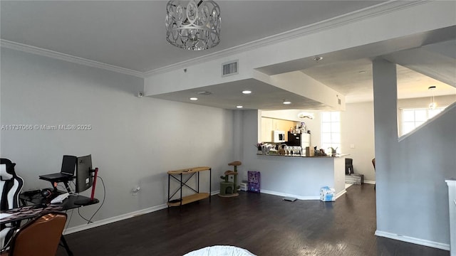 interior space featuring ornamental molding and dark hardwood / wood-style flooring