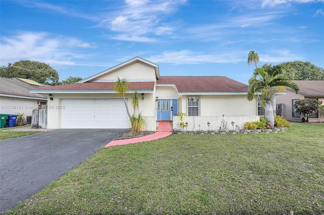 single story home featuring a garage and a front yard