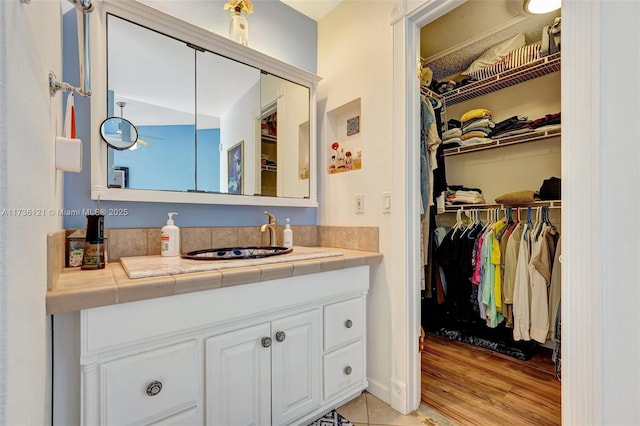 bathroom featuring vanity and hardwood / wood-style floors