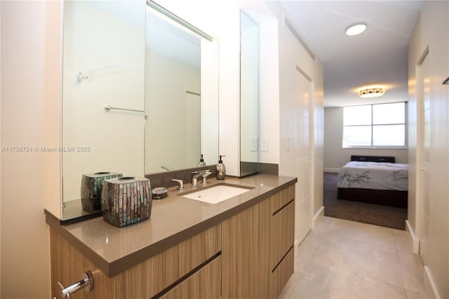 bathroom featuring vanity and tile patterned flooring