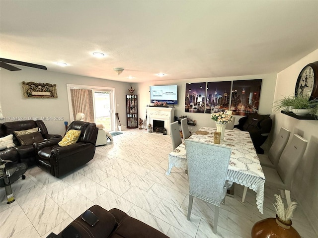 dining room featuring ceiling fan