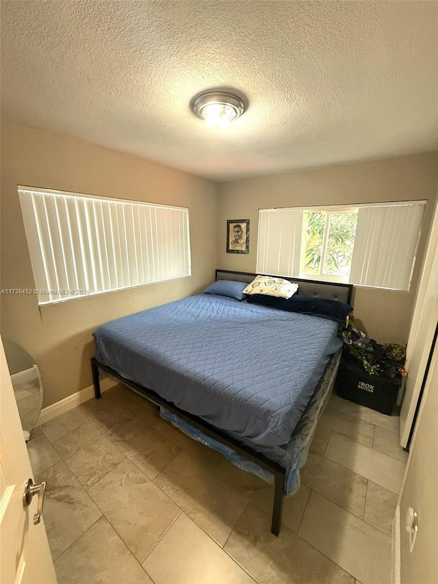 bedroom with a textured ceiling