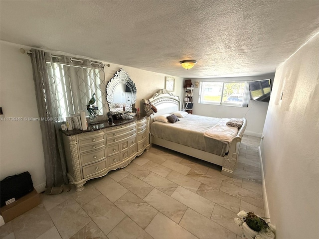 bedroom with a textured ceiling