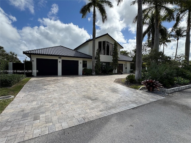 view of front of property with a garage