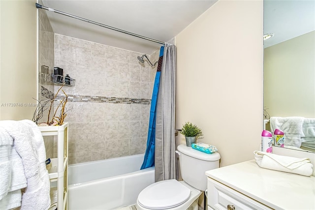 full bathroom with shower / tub combo, vanity, and toilet