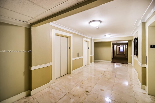 corridor featuring ornamental molding, elevator, and light tile patterned flooring