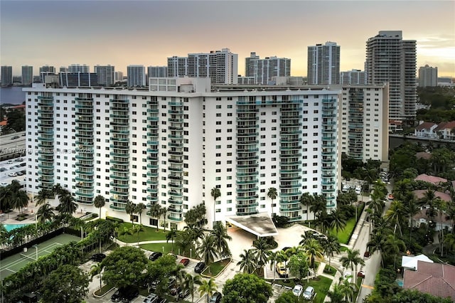 view of outdoor building at dusk