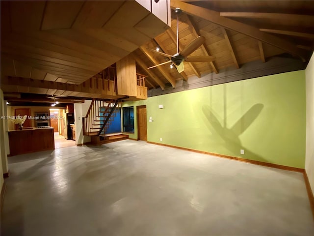 interior space featuring ceiling fan, beam ceiling, high vaulted ceiling, wooden ceiling, and concrete floors