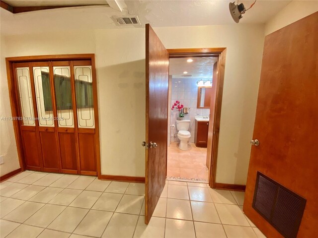 view of tiled foyer entrance