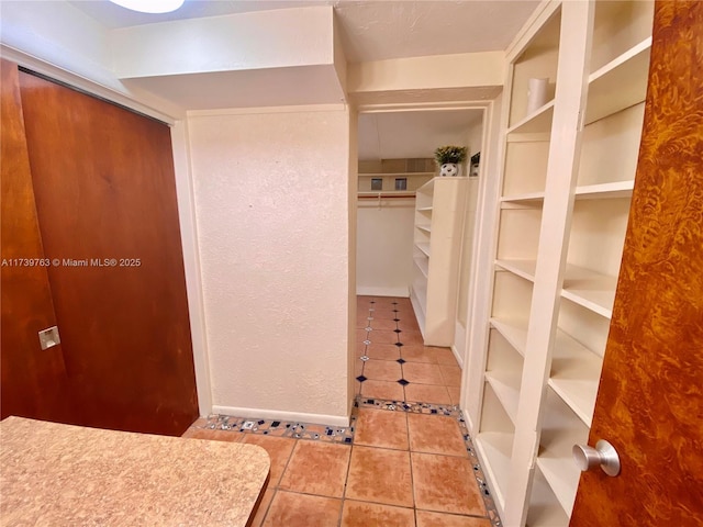 interior space with tile patterned floors