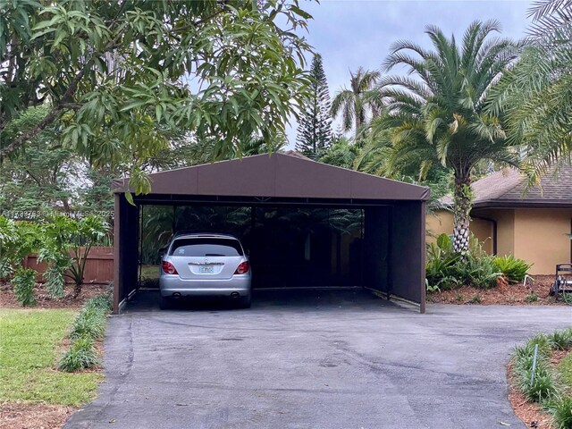 garage with a carport