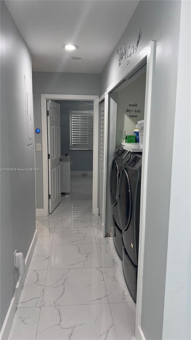 laundry area featuring independent washer and dryer