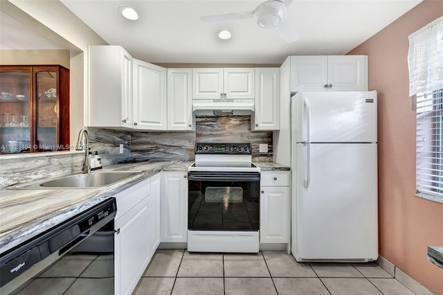 kitchen featuring sink, dishwasher, white cabinetry, electric range oven, and white fridge