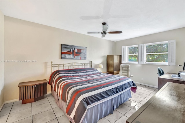 bedroom with light tile patterned floors and ceiling fan