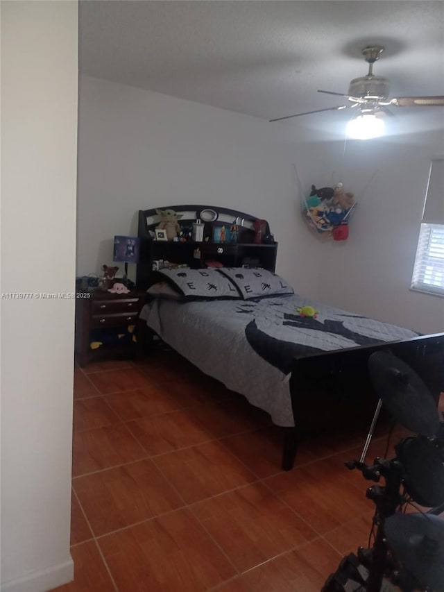 bedroom featuring ceiling fan