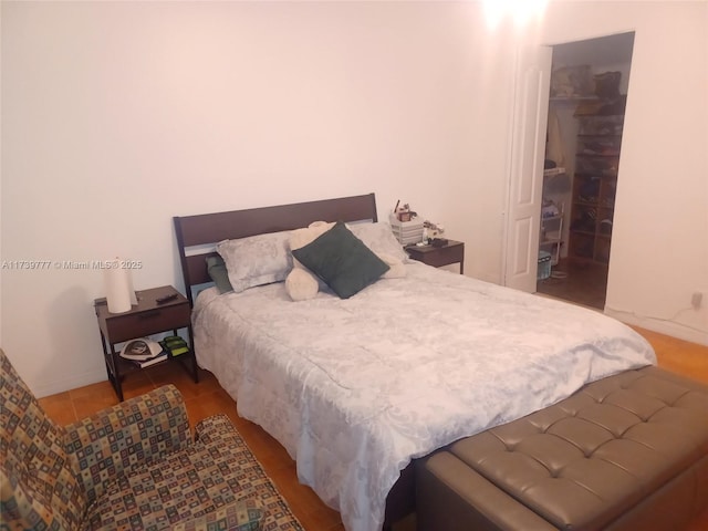 bedroom featuring tile patterned floors