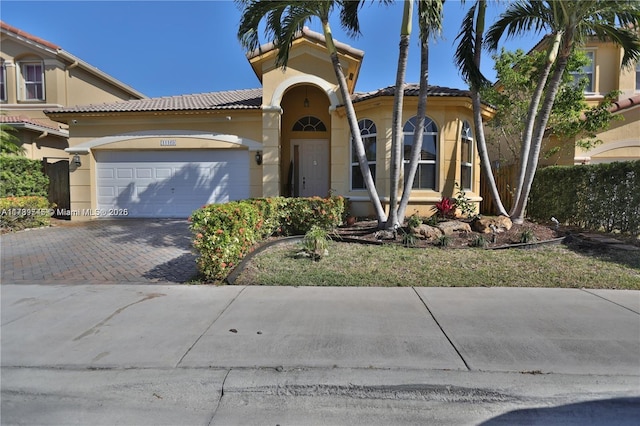 view of front of property featuring a garage