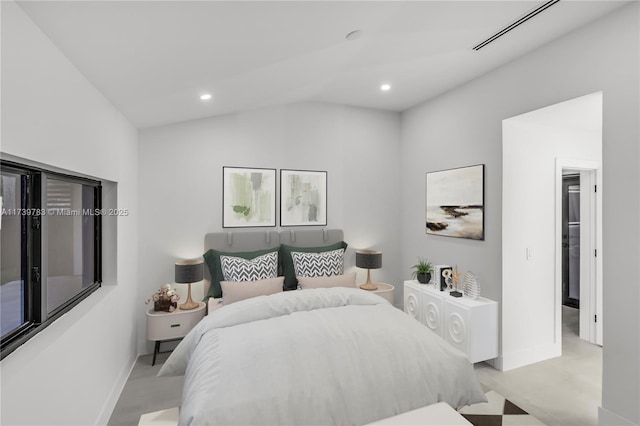 bedroom featuring lofted ceiling