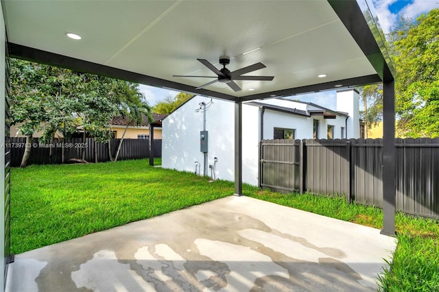 view of patio / terrace featuring ceiling fan