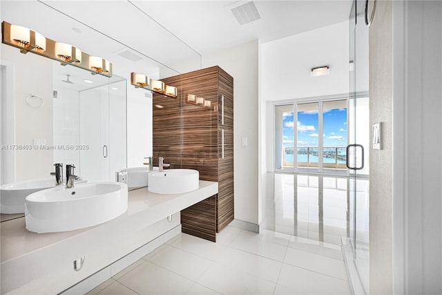 bathroom featuring tile patterned floors and vanity