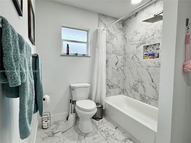 bathroom featuring shower / tub combo and toilet