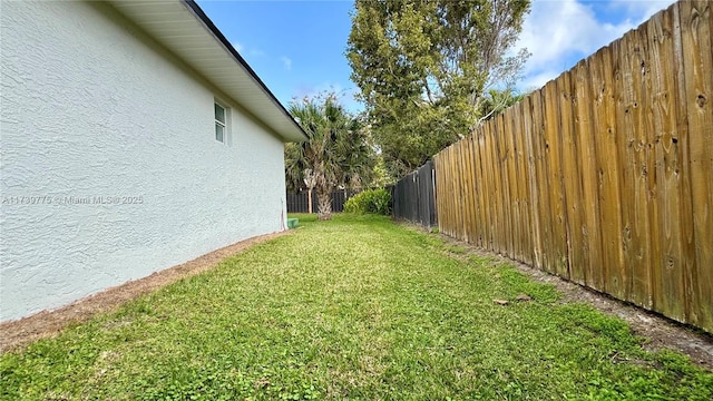 view of yard featuring a fenced backyard