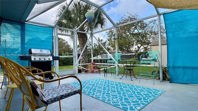 view of patio featuring area for grilling, a lanai, and a playground