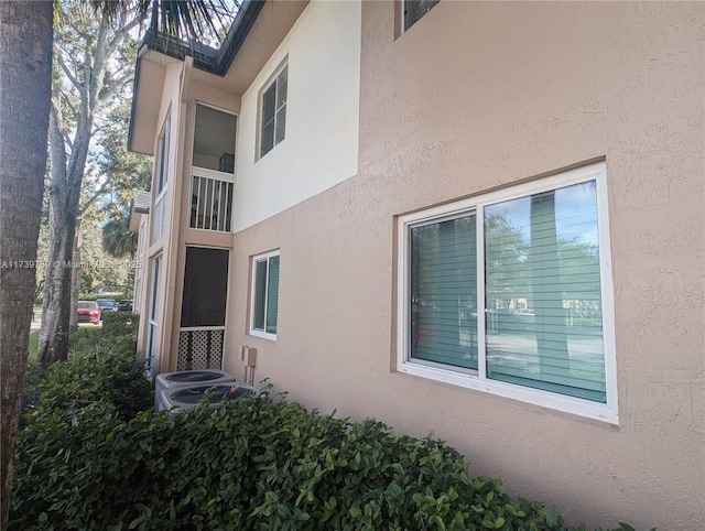 view of home's exterior with central air condition unit