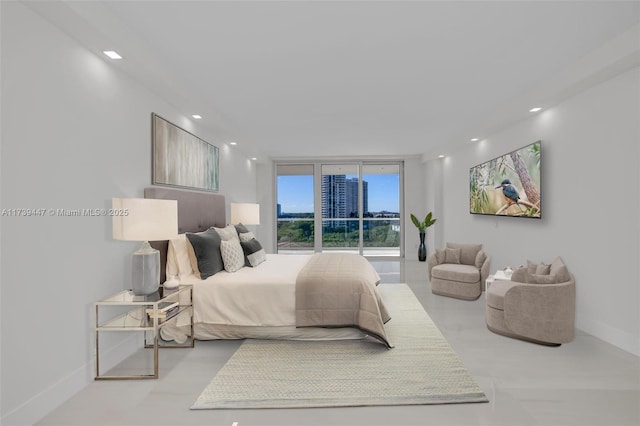 bedroom with recessed lighting and baseboards