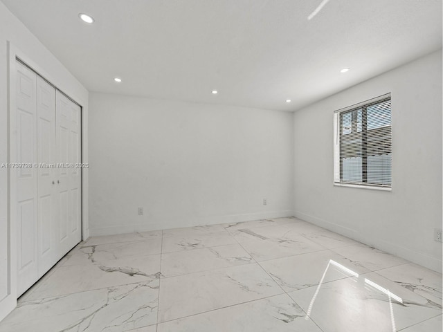 unfurnished bedroom featuring a closet