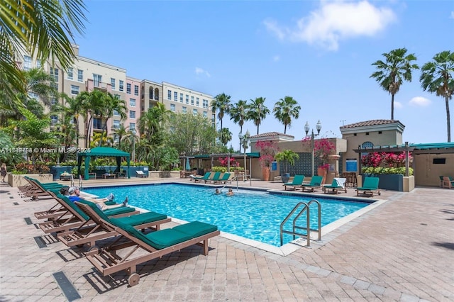 view of swimming pool with a patio area