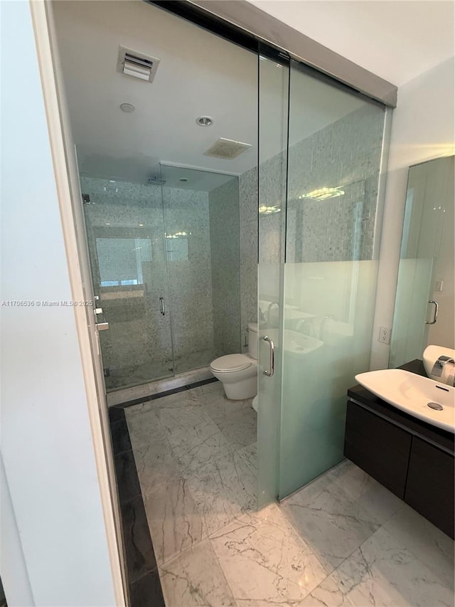 200 Biscayne Boulevard Way Unit 4904, Miami, FL 33131 - full bathroom with vanity, marble finish flooring, and a stall shower