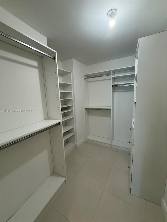 200 Biscayne Boulevard Way Unit 4904, Miami, FL 33131 - spacious closet with light tile patterned floors